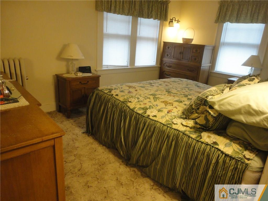 106 Walker Road West Orange, NJ 07052 - Photo 18 of 25 a bedroom with a bed and teddy bear on bed