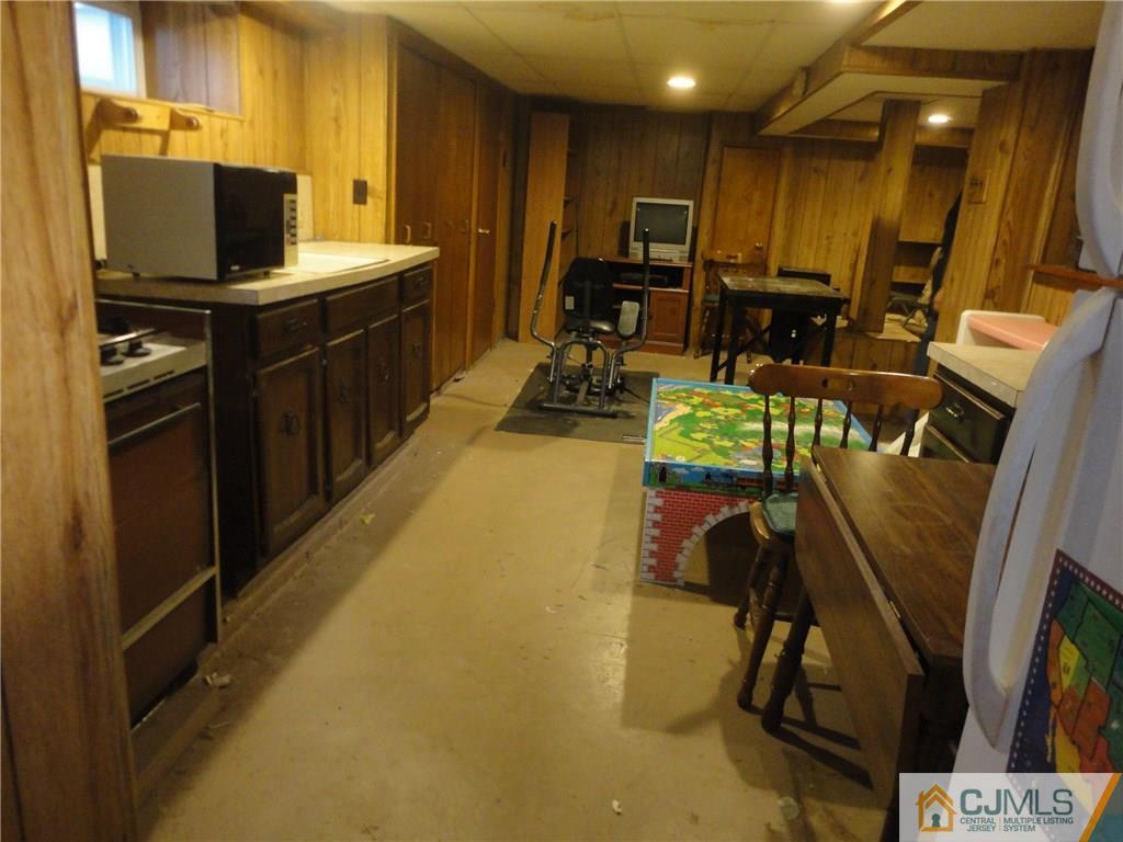 106 Walker Road West Orange, NJ 07052 - Photo 22 of 25 a view of a room with gym equipment