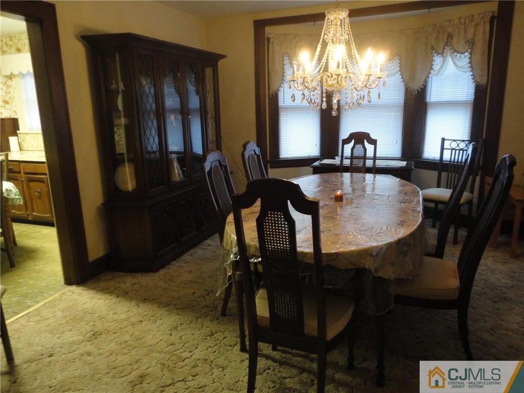 106 Walker Road West Orange, NJ 07052 - Photo 10 of 25 a dining room with furniture and window