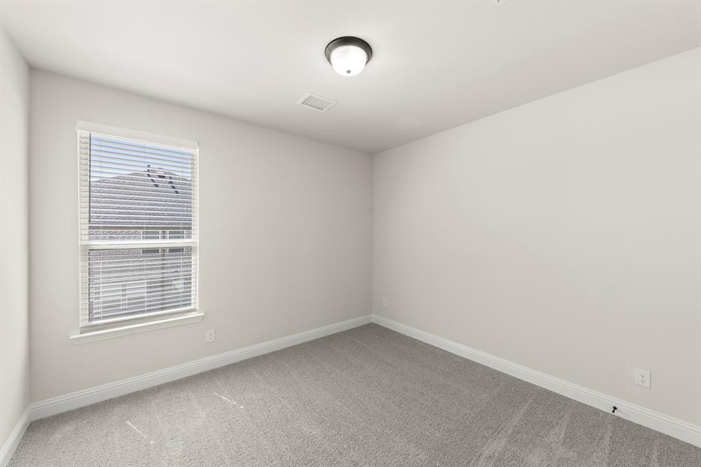 3900 Keya Drive Prosper, TX 75078 - Photo 26 of 36 an empty room with a window