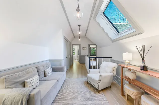 a bedroom with bed and window