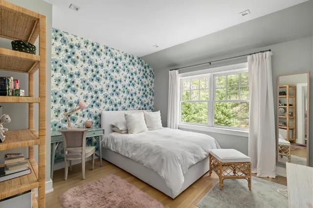 a bathroom with a granite countertop sink mirror and double
