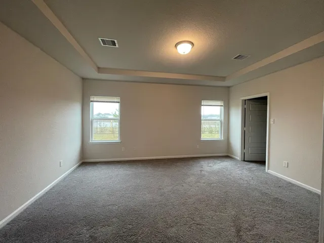 an empty room with windows