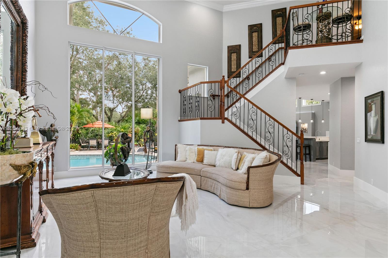 6563 Northwest 127th Terrace Parkland, FL 33076 - Photo 20 of 97 a living room with furniture and potted plants