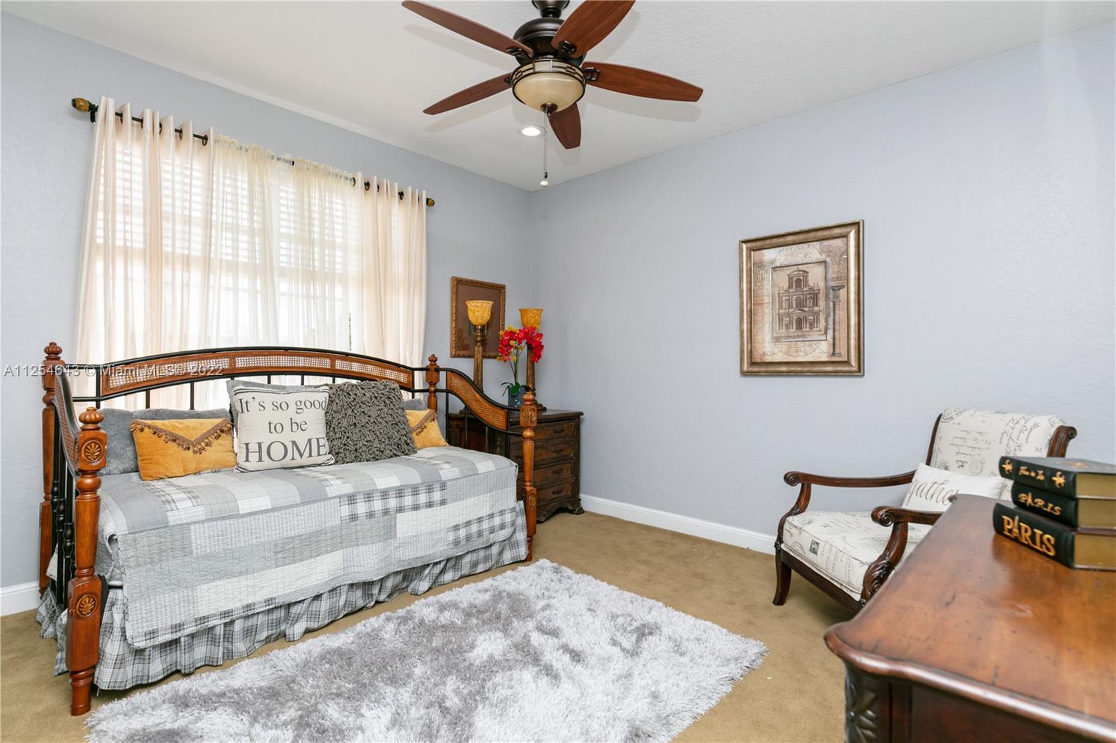 6563 Northwest 127th Terrace Parkland, FL 33076 - Photo 28 of 97 a bedroom with furniture and a window