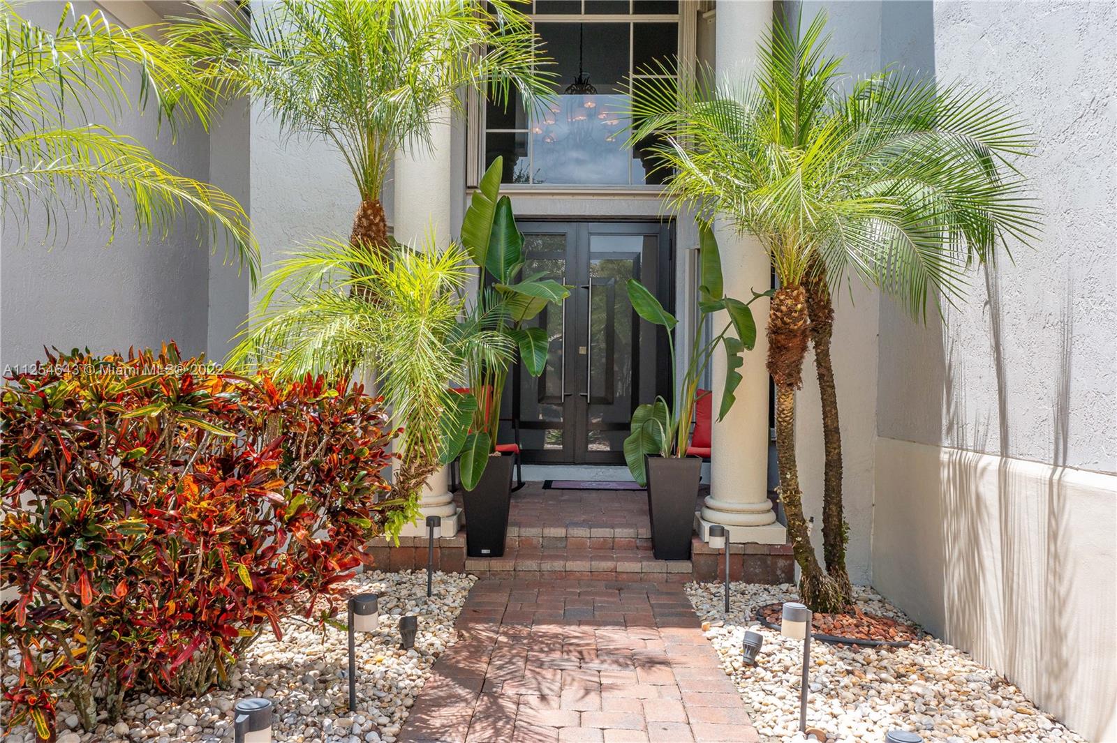 6563 Northwest 127th Terrace Parkland, FL 33076 - Photo 61 of 97 a view of path along with house and trees around