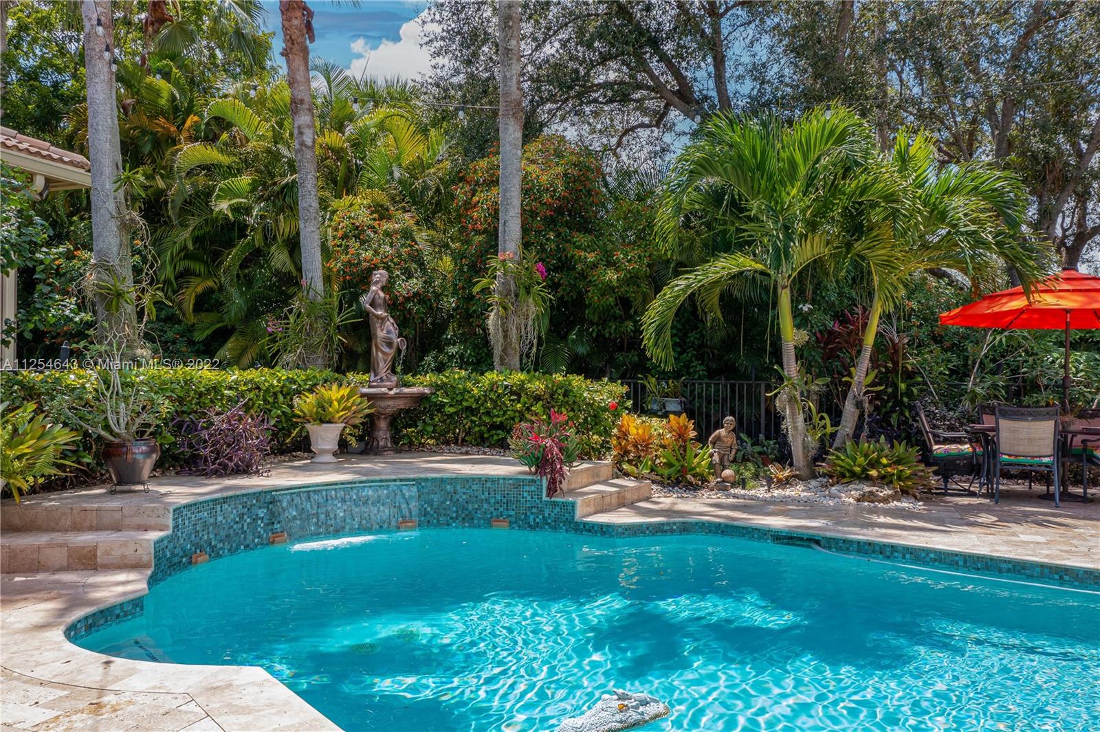 6563 Northwest 127th Terrace Parkland, FL 33076 - Photo 72 of 97 a view of a bench in front of house