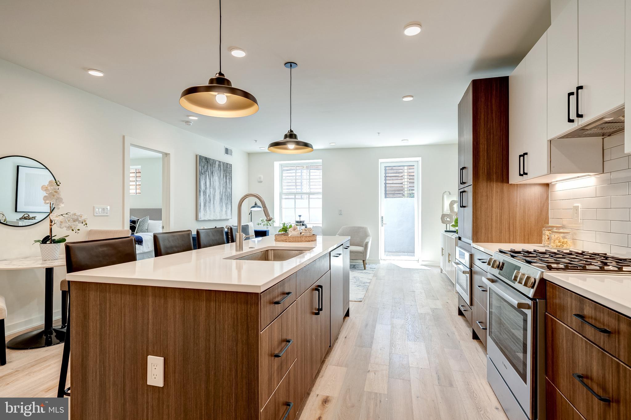 440 R Street Northwest, Unit 3 Washington, DC 20001 - Photo 9 of 24 Quartz countertops & stainless steel appliances