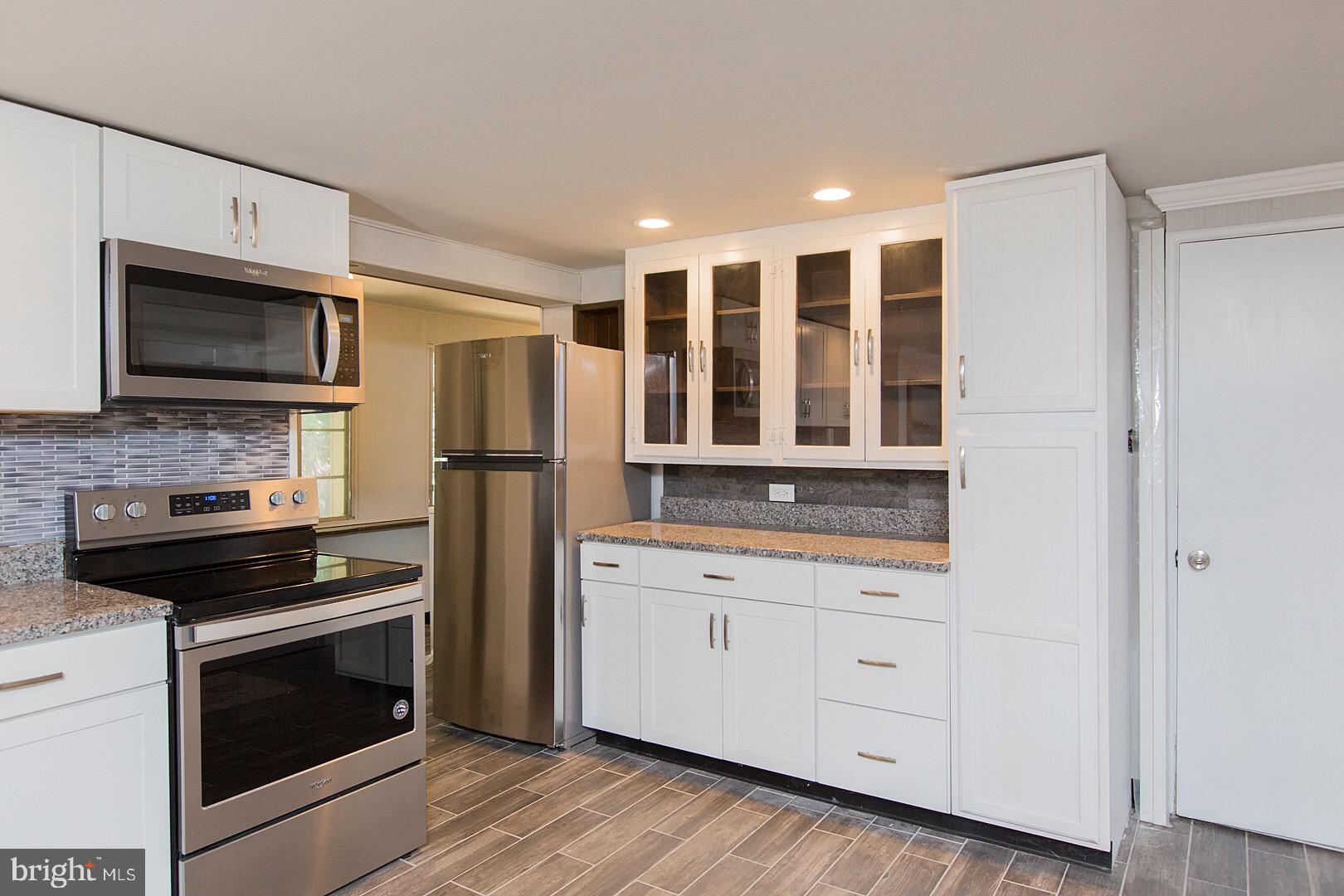 115 Market Street Lititz, PA 17543 - Photo 26 of 79 Tiled backsplash and flooring