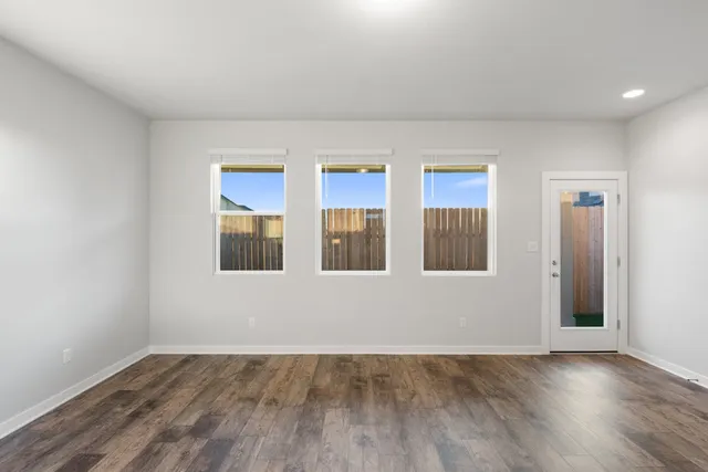 a view of kitchen with wooden floor