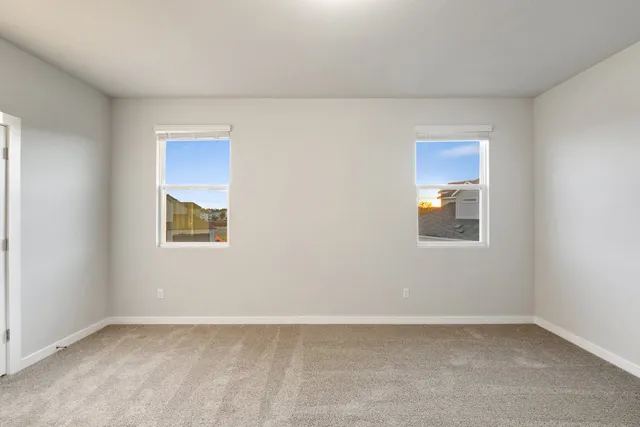 a spacious bathroom with a shower sink and mirror
