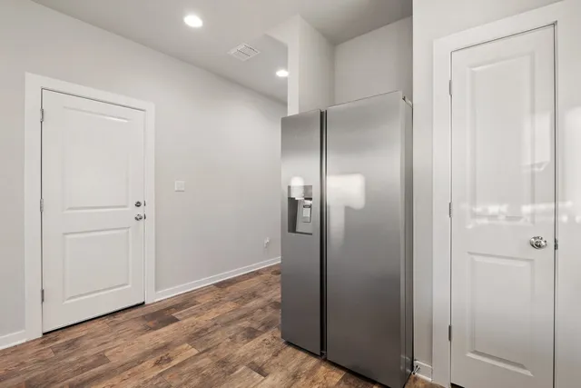 a kitchen with a sink stove and microwave