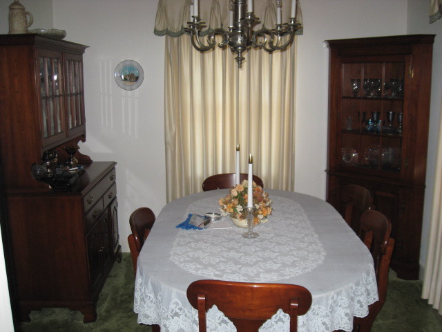 4003 Cove Road Roanoke, VA 24017 - Photo 11 of 14 a view of a dining room with a table and chairs