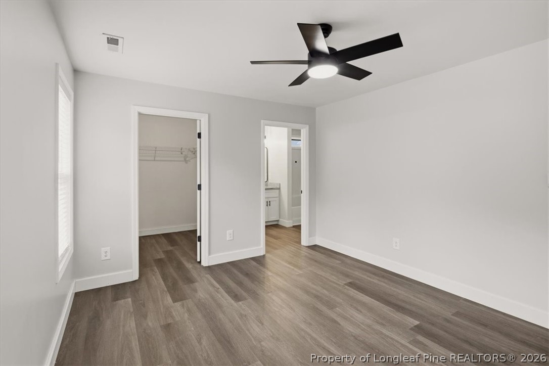 170 Starlight Road Lillington, NC 27546 - Photo 21 of 37 a view of empty room with wooden floor