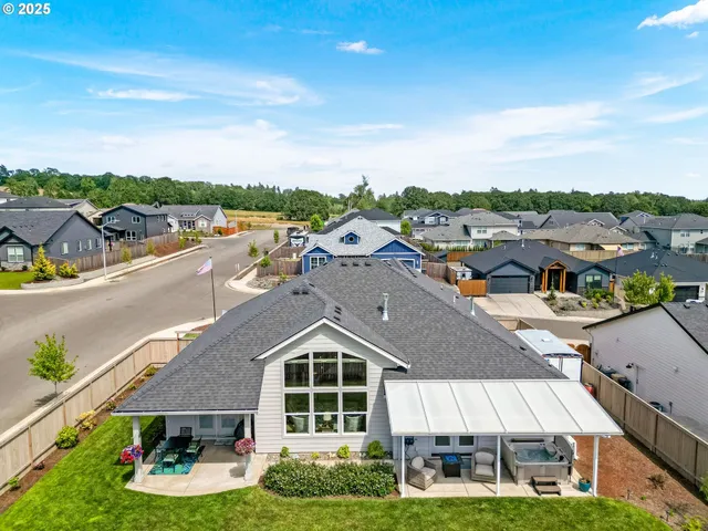 a aerial view of a house with a garden and plants