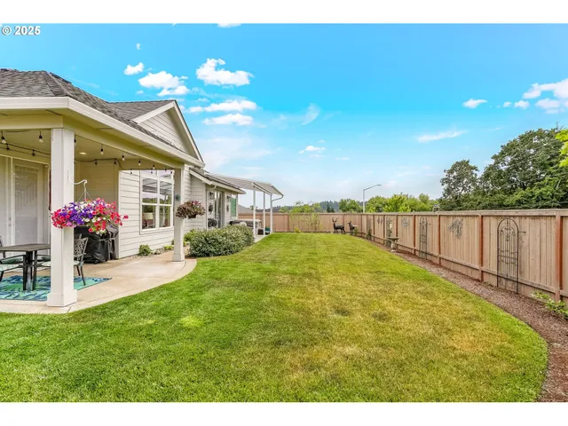 a view of a backyard with a garden