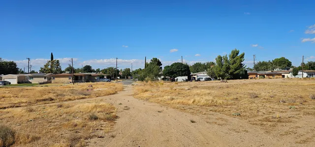 a view of swimming pool with outdoor seating