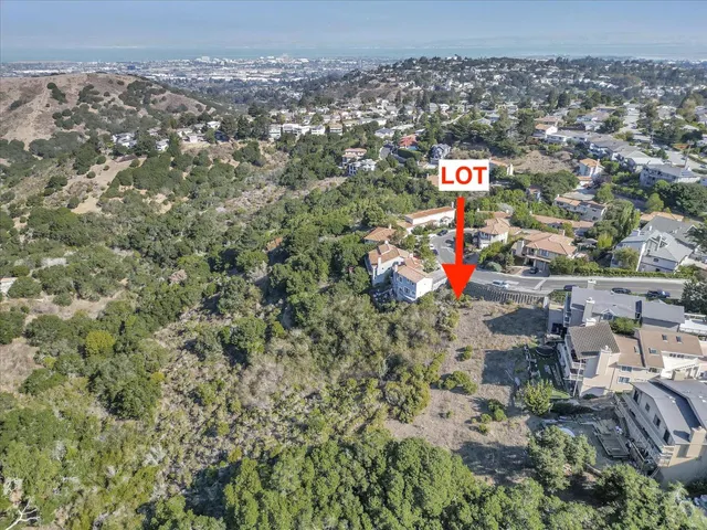 an aerial view of residential house with outdoor space