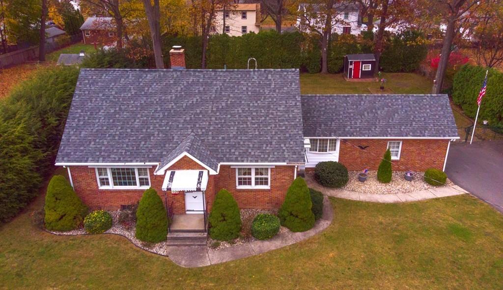 154 Prouty Street Springfield, MA 01119 - Photo 4 of 26 front view of a house with a yard