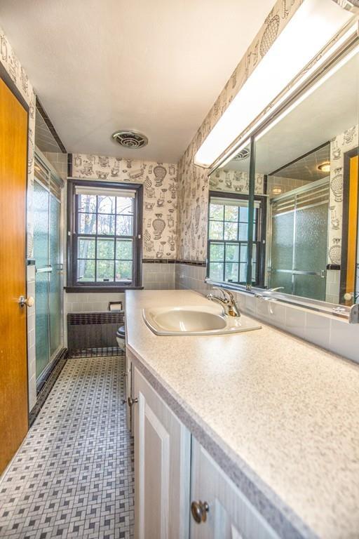 154 Prouty Street Springfield, MA 01119 - Photo 9 of 26 a swimming pool with large glass windows and painted walls