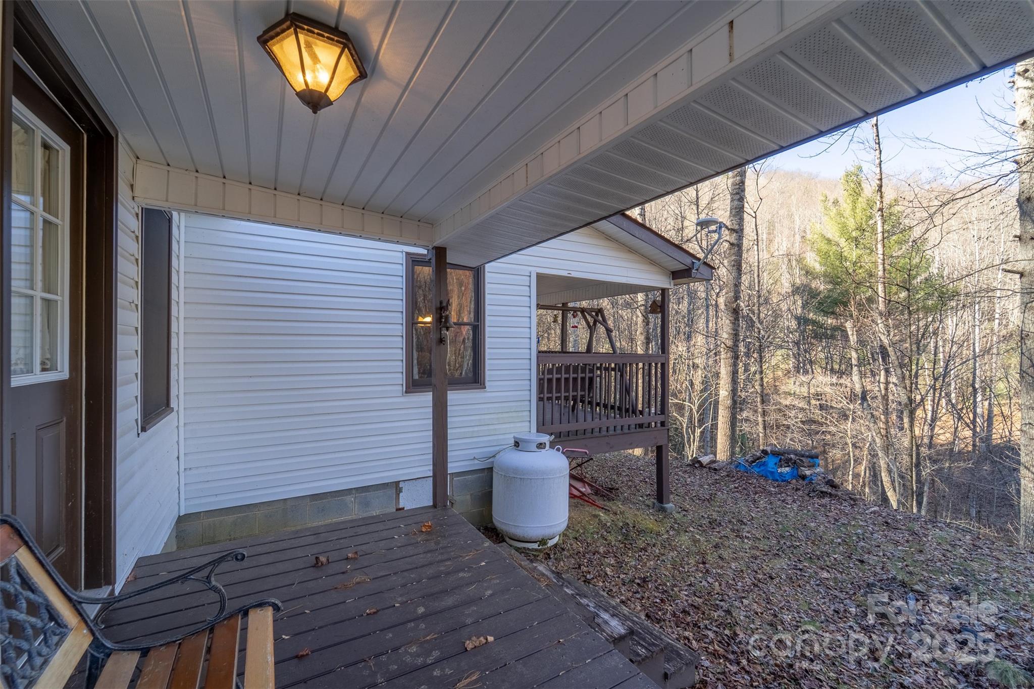109 Hog Cove Road Sylva, NC 28779 - Photo 11 of 48 a view of a porch with furniture