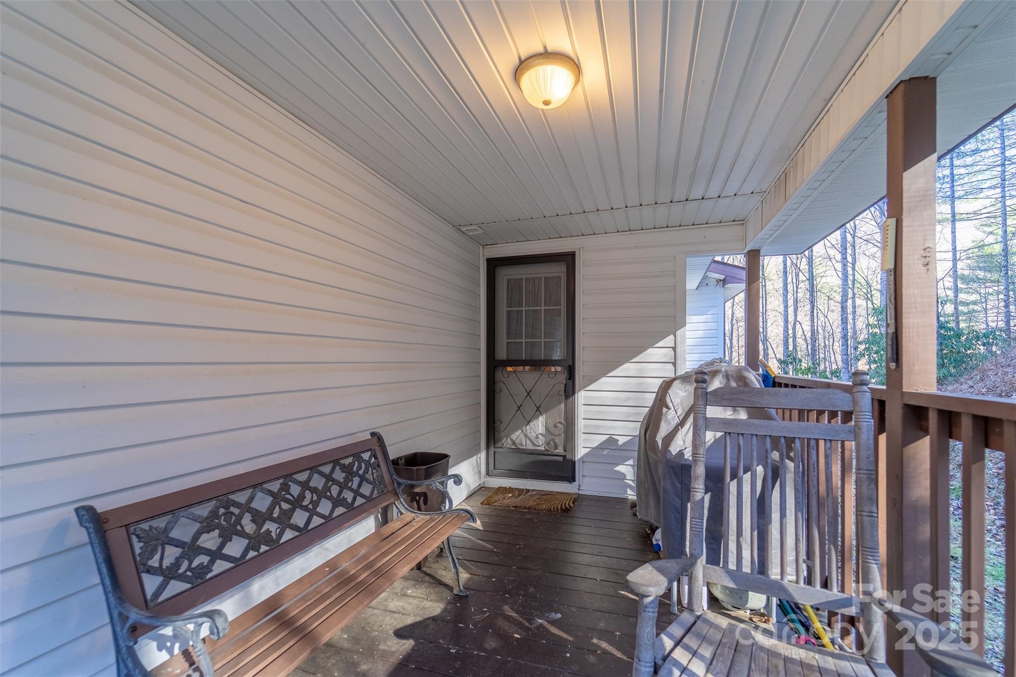 109 Hog Cove Road Sylva, NC 28779 - Photo 7 of 48 a view of entryway with wooden floor