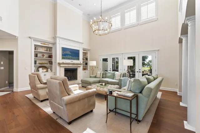 a large kitchen with stainless steel appliances granite countertop a stove and a sink with cabinets