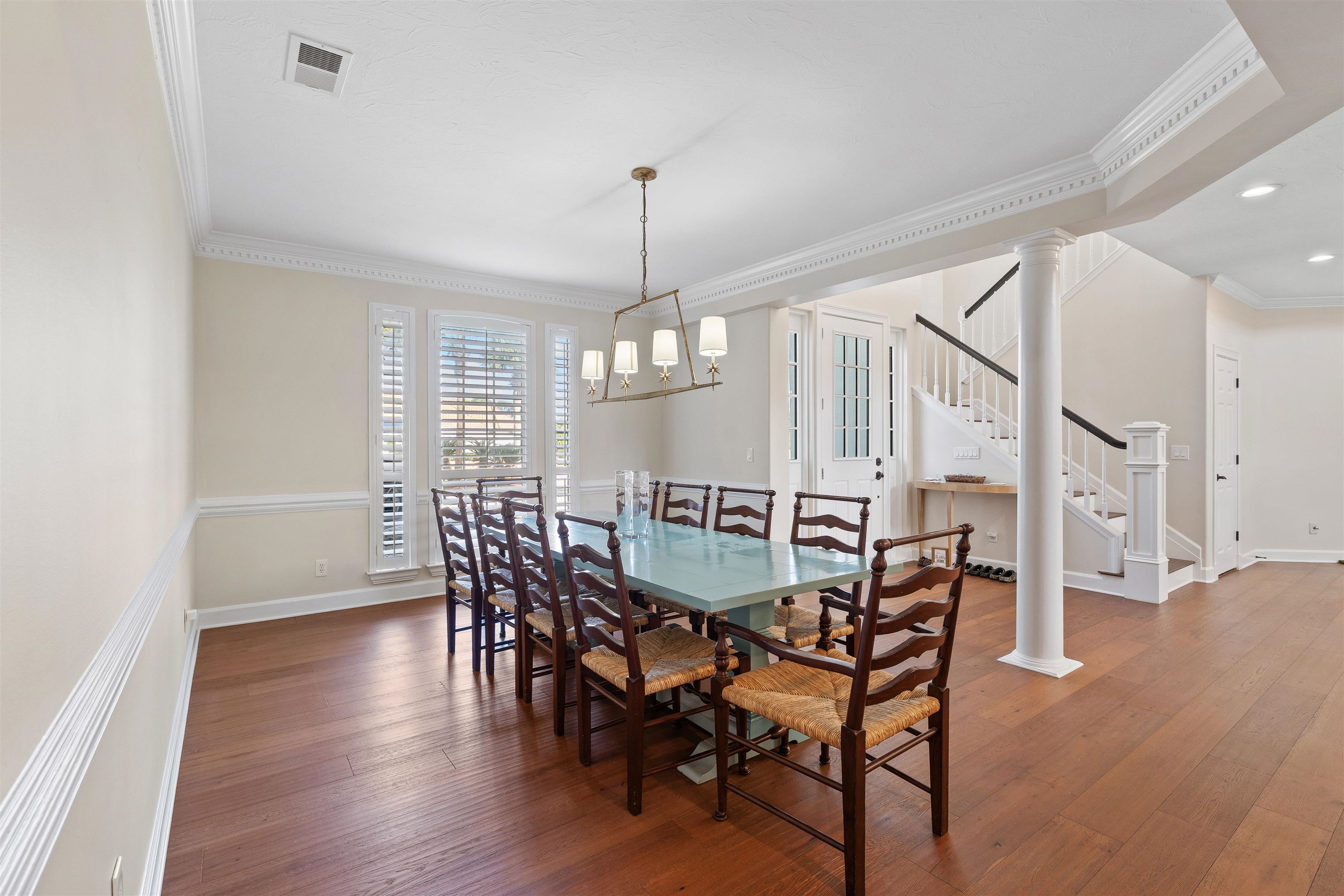 207 Marshside Drive St. Augustine, FL 32080 - Photo 23 of 87 a view of a dining room with furniture window and wooden floor