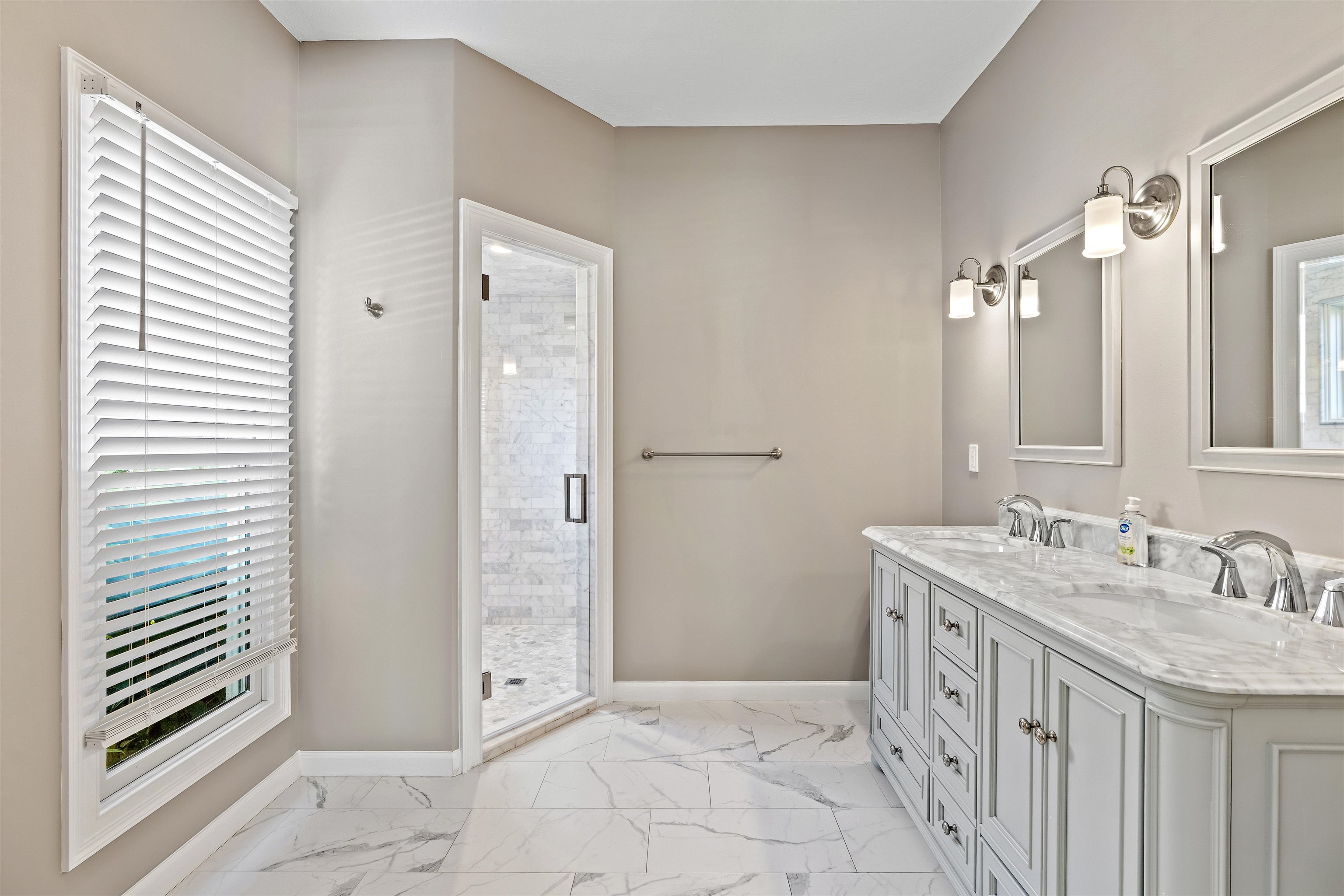 207 Marshside Drive St. Augustine, FL 32080 - Photo 46 of 87 a bathroom with a sink a vanity and a mirror