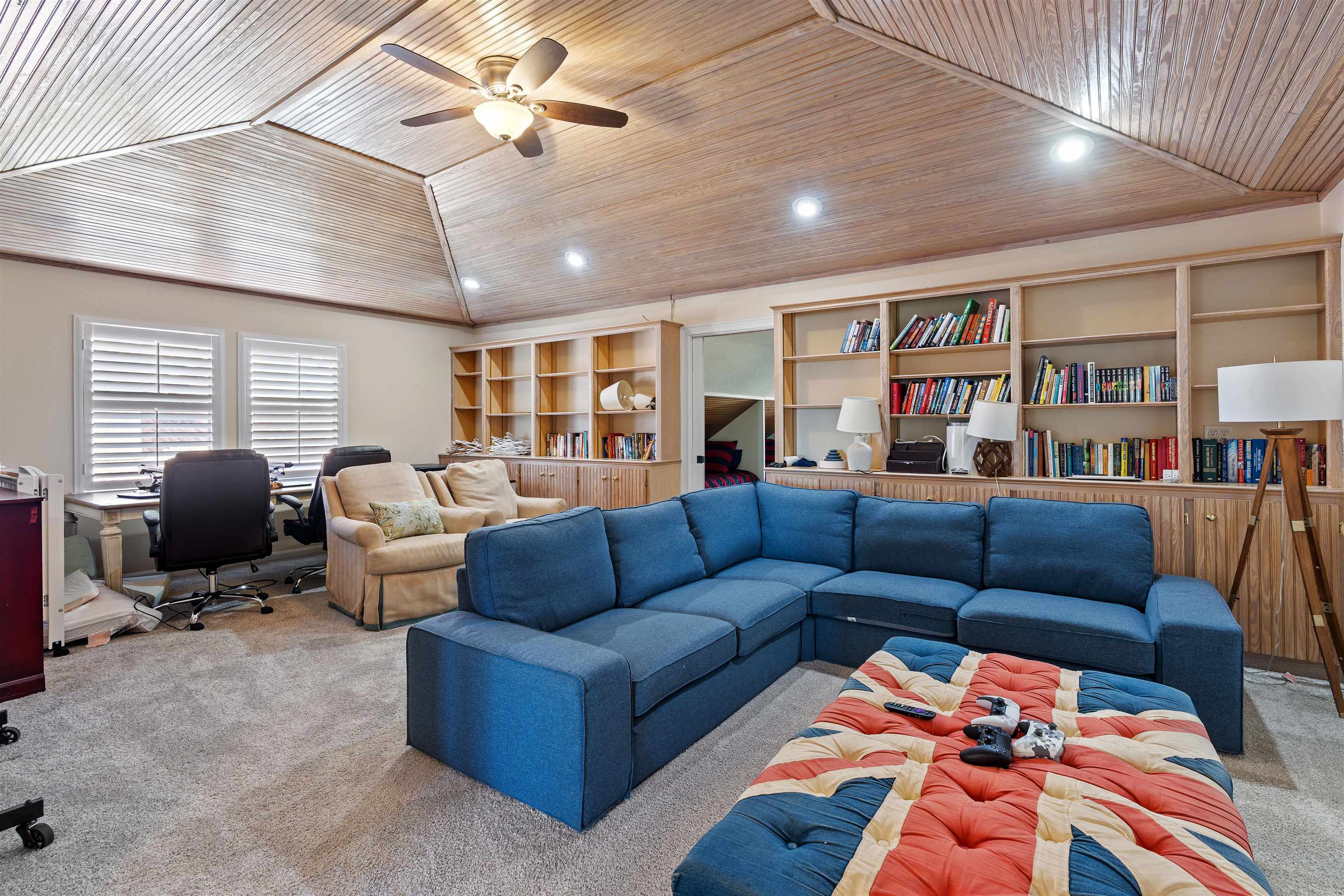 207 Marshside Drive St. Augustine, FL 32080 - Photo 48 of 87 a living room with furniture workspace and a ceiling fan