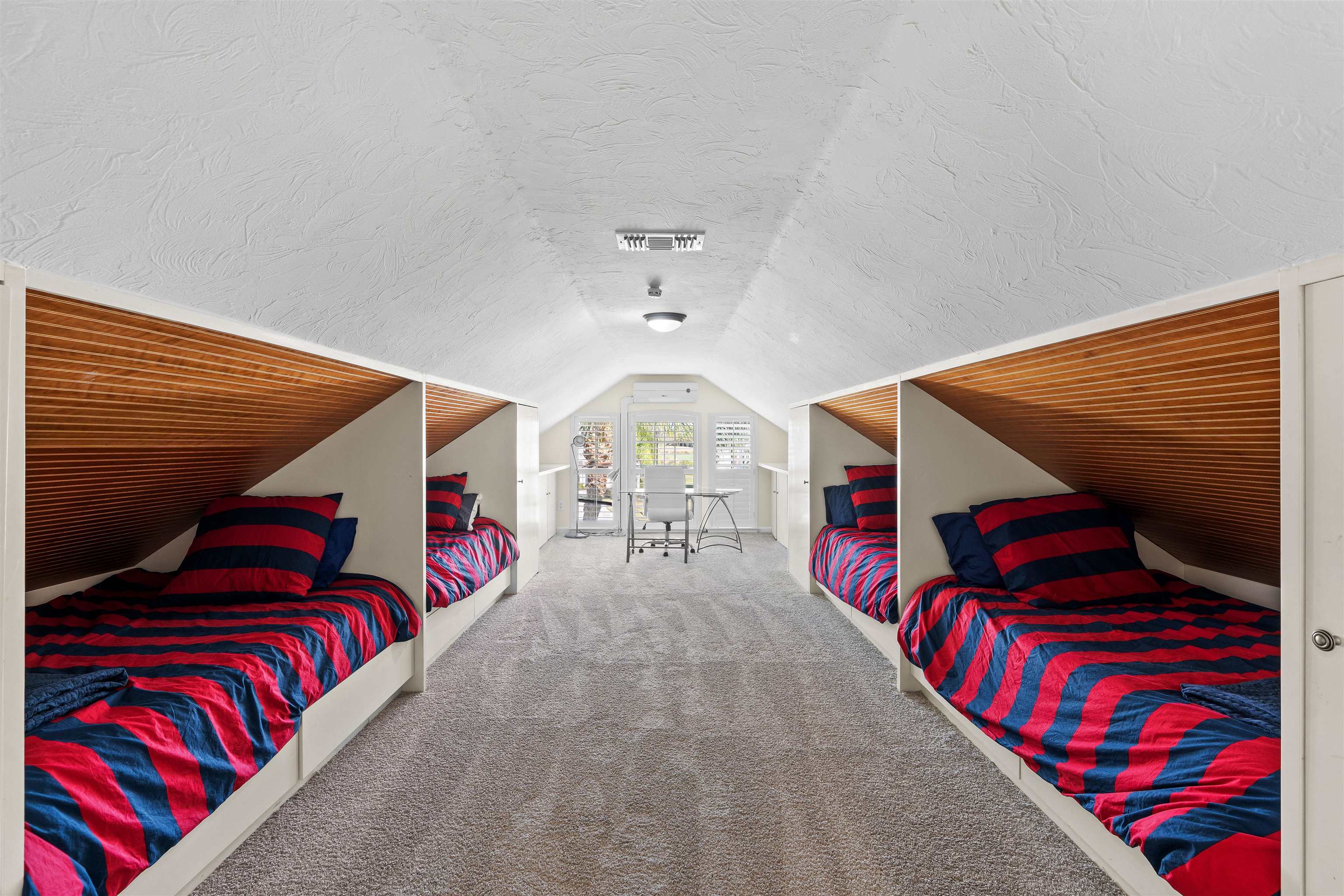 207 Marshside Drive St. Augustine, FL 32080 - Photo 51 of 87 Bedroom with carpet, a textured ceiling, and vaulted ceiling