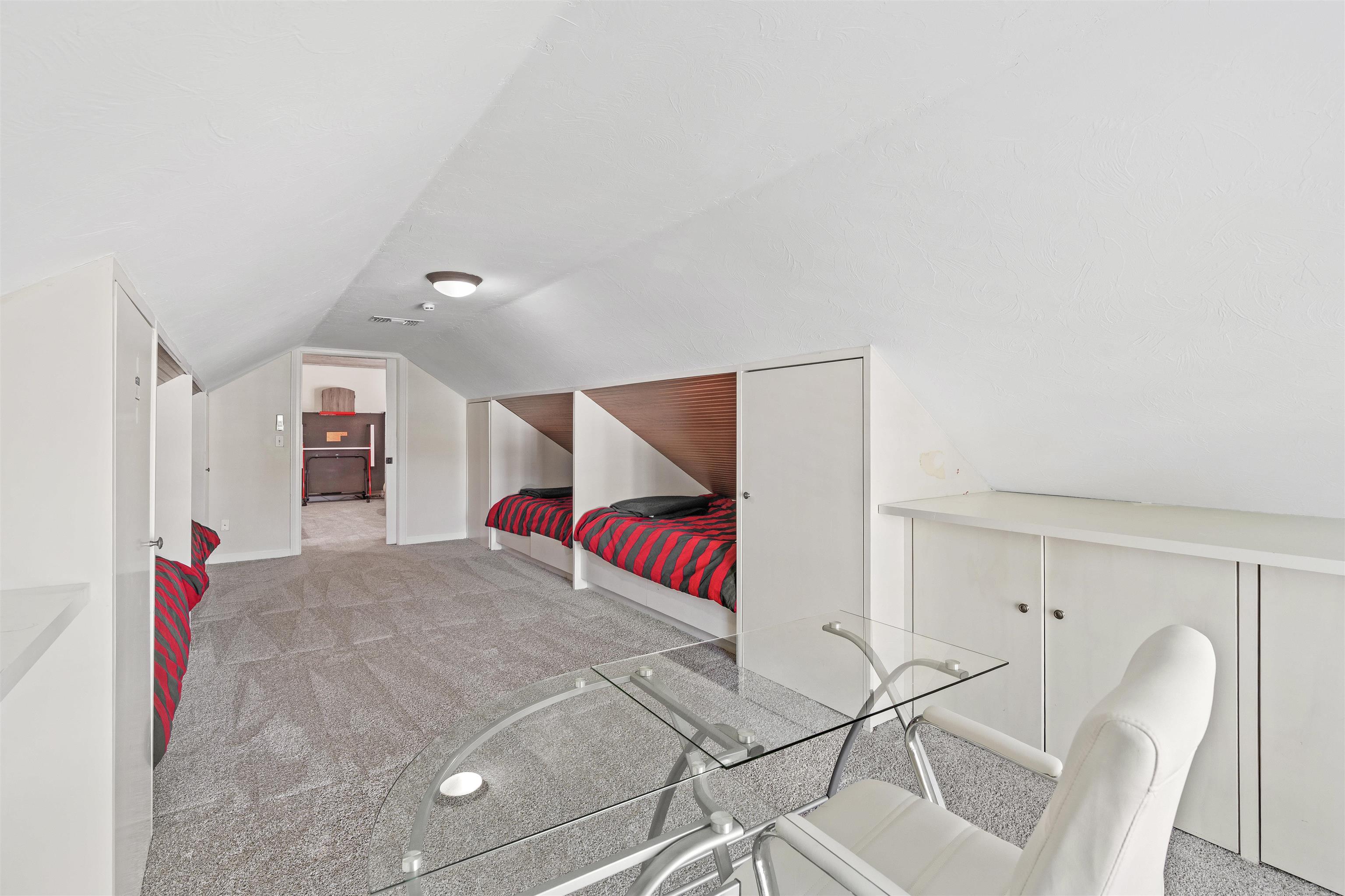 207 Marshside Drive St. Augustine, FL 32080 - Photo 52 of 87 Carpeted bedroom featuring vaulted ceiling