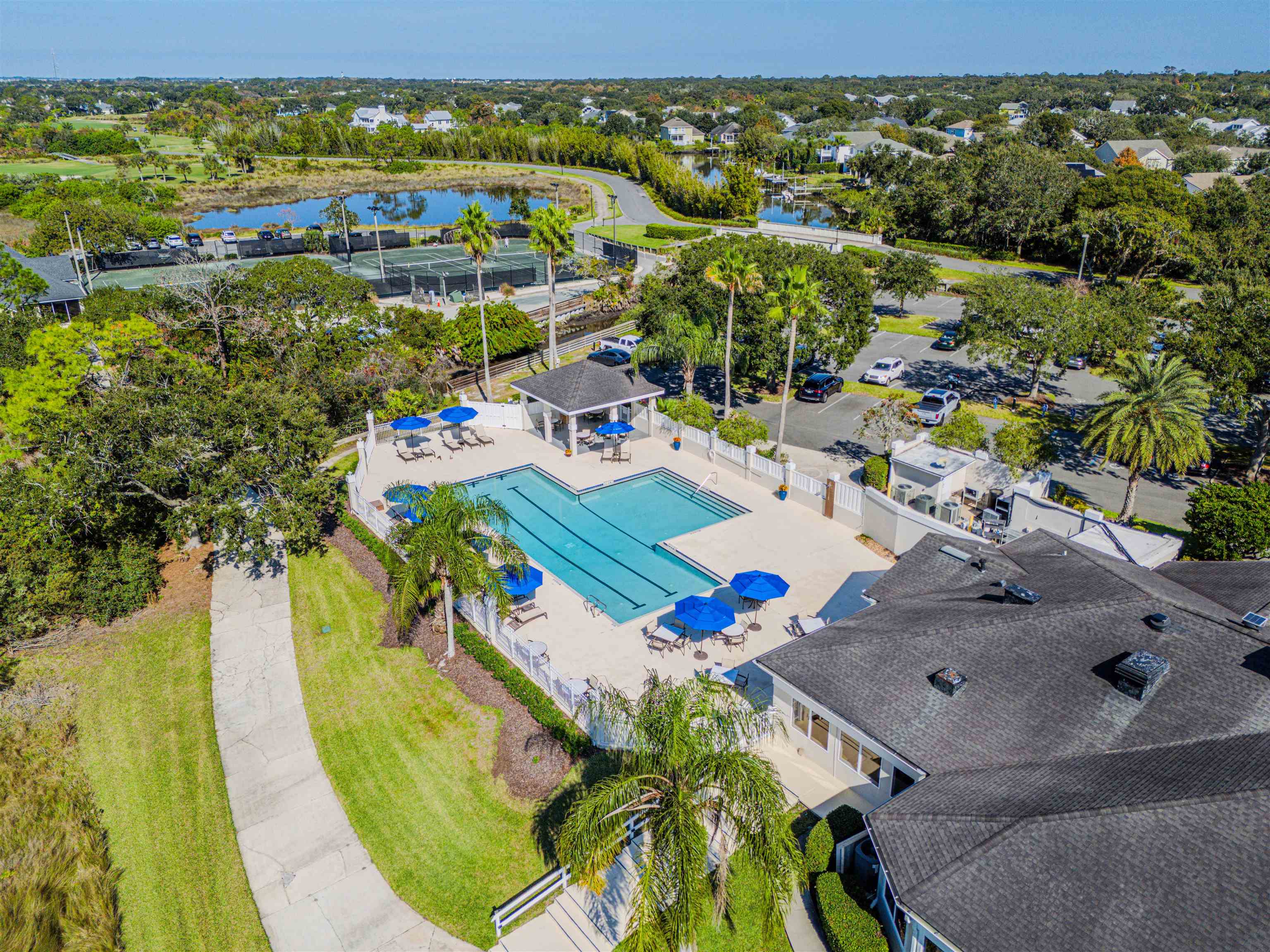 207 Marshside Drive St. Augustine, FL 32080 - Photo 78 of 87 Drone / aerial view of a pool area and a nearby body of water