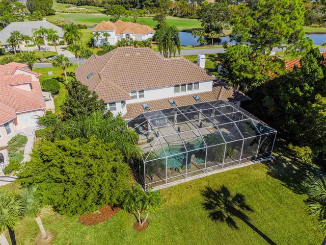 a view of an entryway with wooden floor and front door