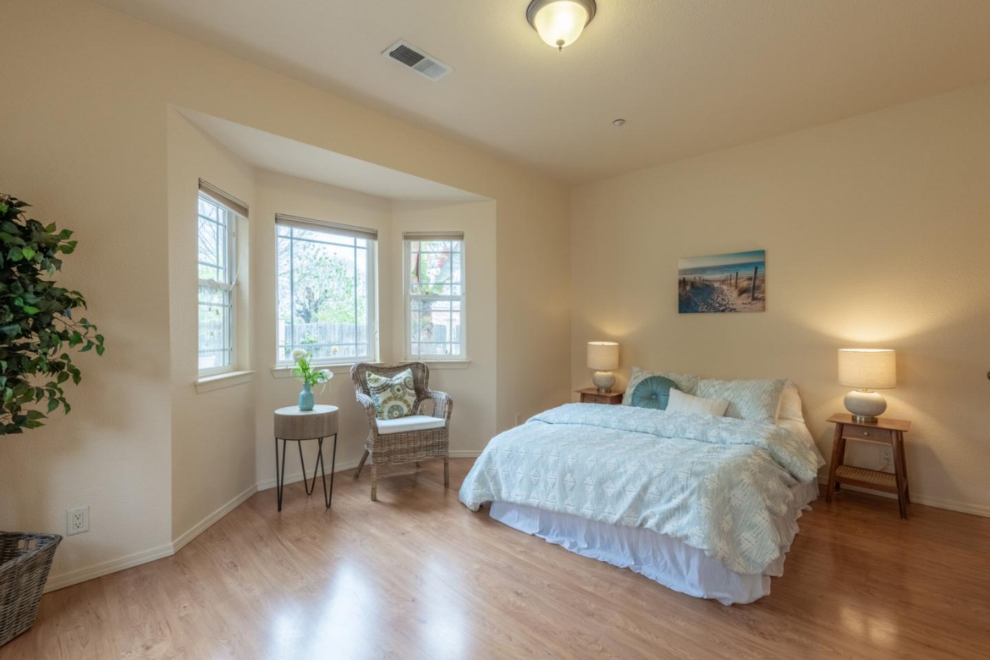 10233 Reese Circle Salinas, CA 93907 - Photo 21 of 49 a bedroom with a bed and a window