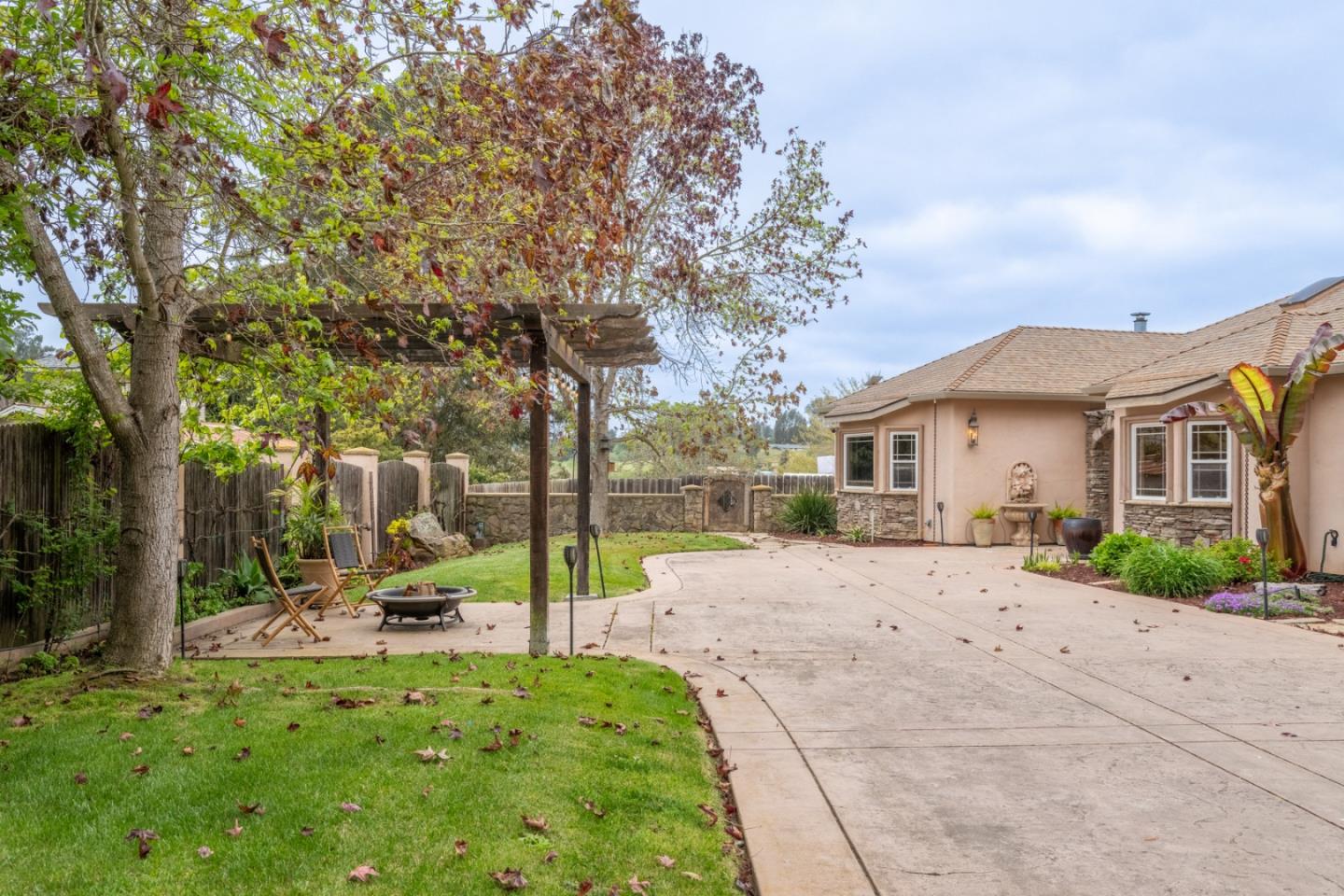 10233 Reese Circle Salinas, CA 93907 - Photo 32 of 49 a view of a house with backyard and tree