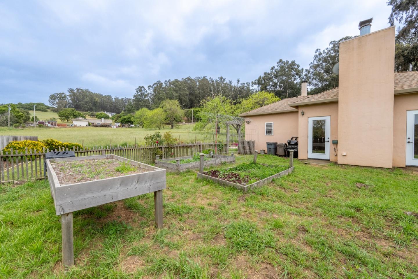 10233 Reese Circle Salinas, CA 93907 - Photo 34 of 49 a view of a house with backyard porch and furniture