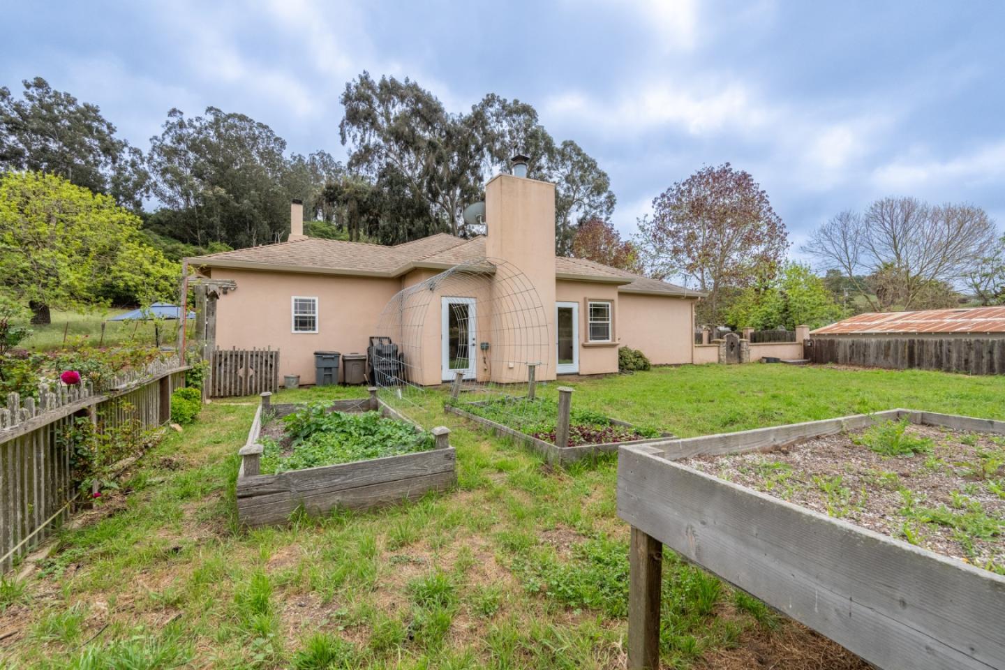 10233 Reese Circle Salinas, CA 93907 - Photo 35 of 49 a view of a house with backyard and a tree