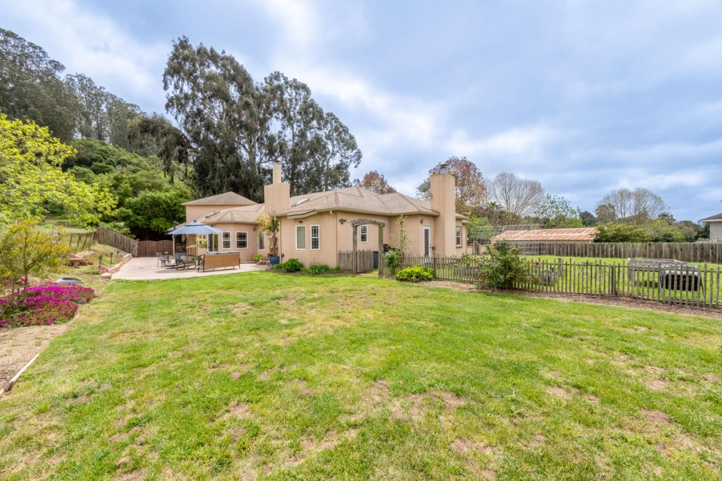 10233 Reese Circle Salinas, CA 93907 - Photo 36 of 49 a front view of a house with garden