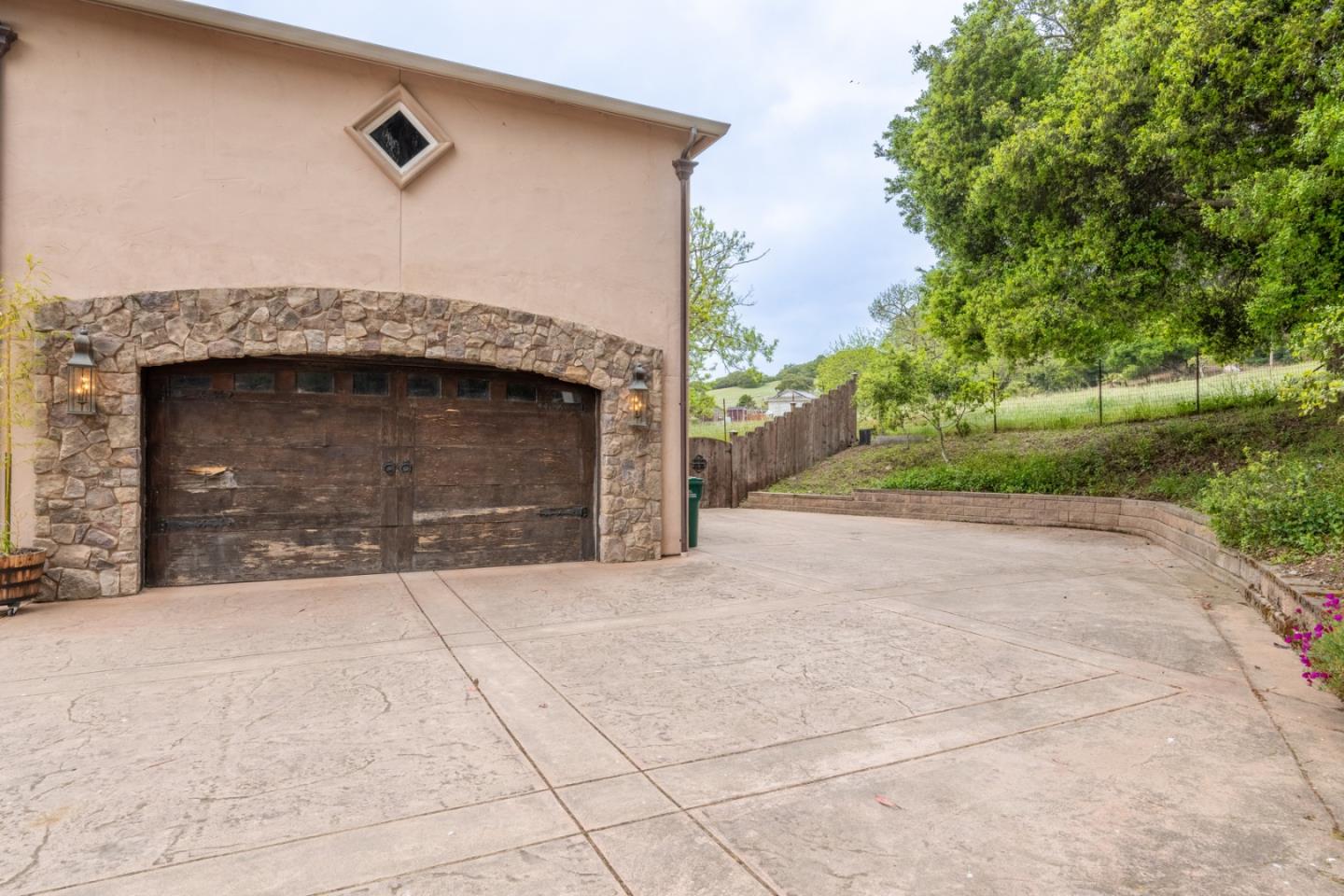10233 Reese Circle Salinas, CA 93907 - Photo 38 of 49 a stone house with a outdoor space