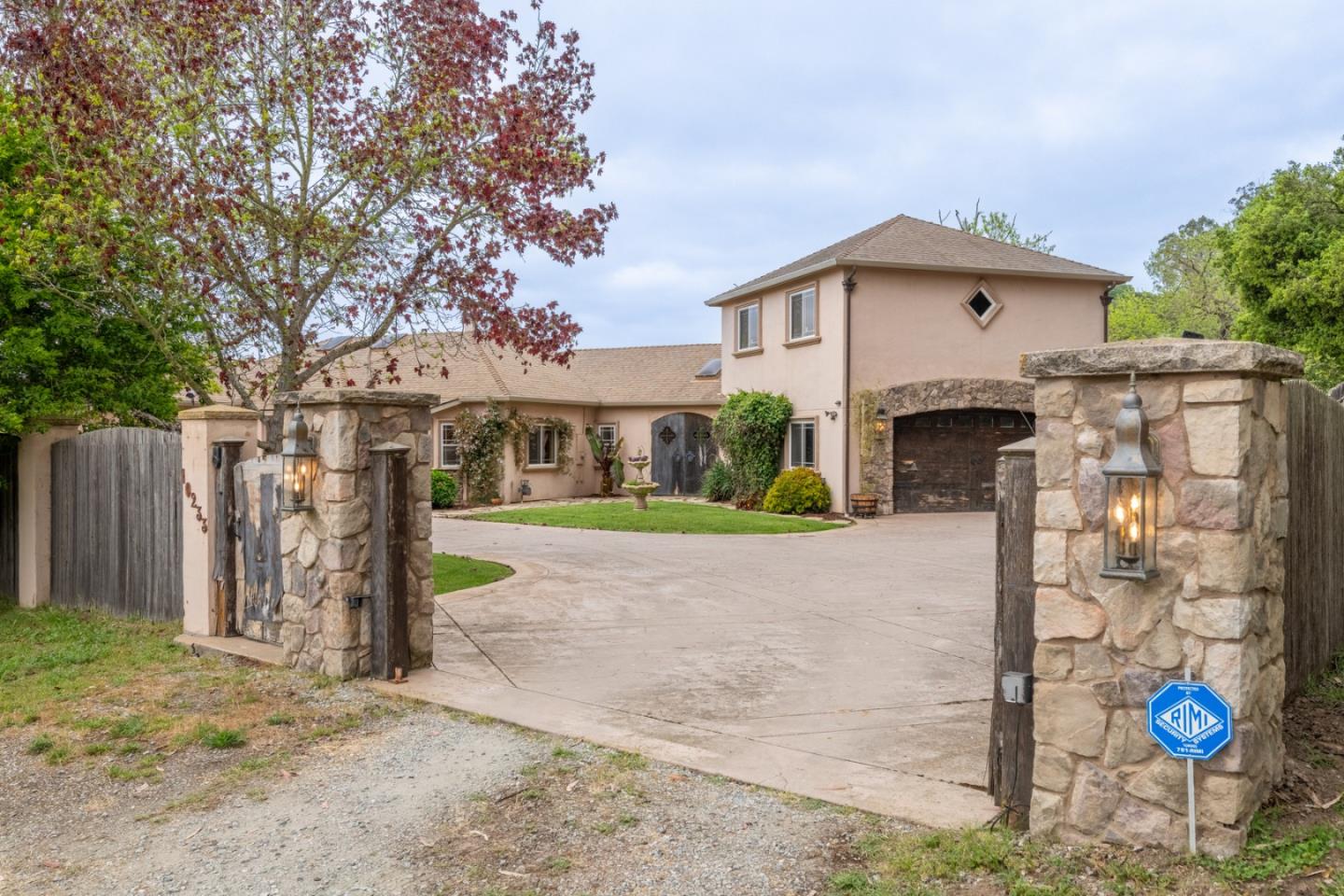 10233 Reese Circle Salinas, CA 93907 - Photo 39 of 49 a front view of a house with garden