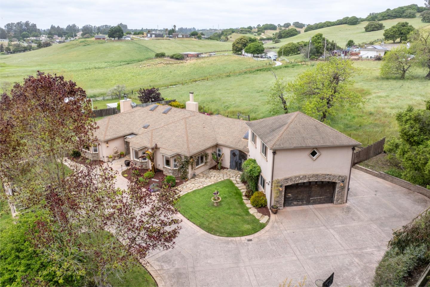 10233 Reese Circle Salinas, CA 93907 - Photo 40 of 49 an aerial view of a house with a garden and lake view