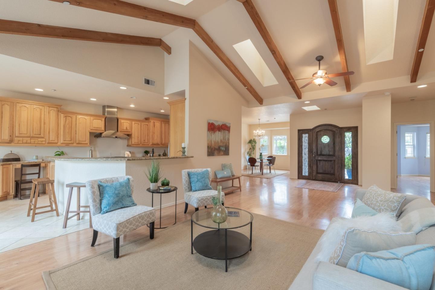 10233 Reese Circle Salinas, CA 93907 - Photo 4 of 49 a living room with furniture and kitchen view