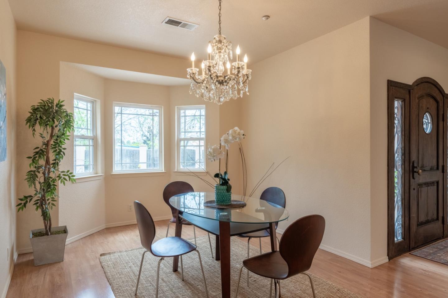 10233 Reese Circle Salinas, CA 93907 - Photo 6 of 49 a view of a dining room with furniture and chandelier