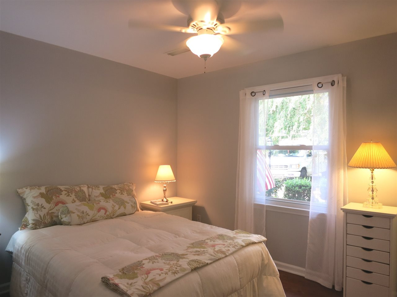 4716 Hiddenbrook Drive Raleigh, NC 27609 - Photo 12 of 25 1st floor Bedroom 5 w/laminate floor, CF & attached Half Bath, great for guests or for use as an Office. 1st Floor Bedroom