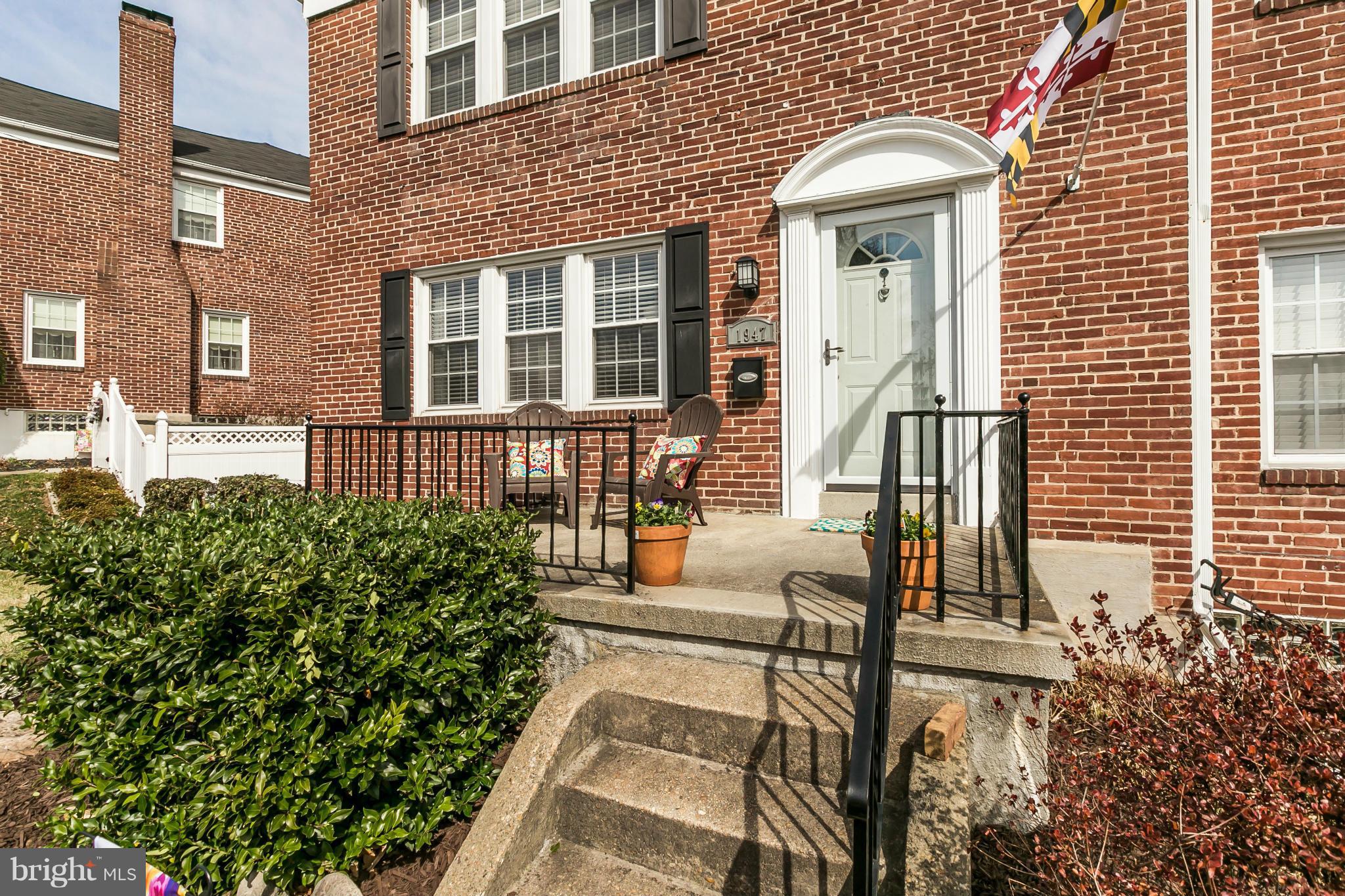 1947 Edgewood Road Baltimore, MD 21286 - Photo 3 of 28 a front view of a house with a yard