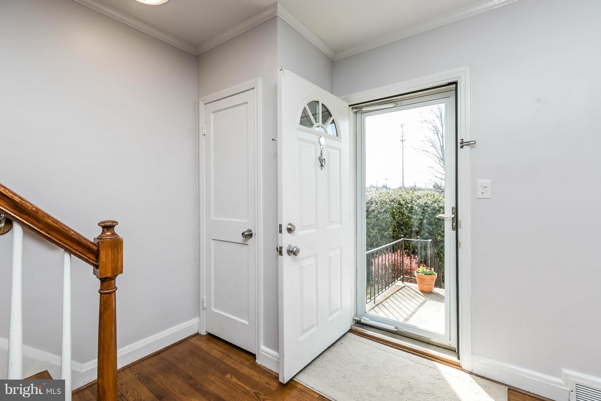 1947 Edgewood Road Baltimore, MD 21286 - Photo 5 of 28 a view of a small space with wooden floor and a window