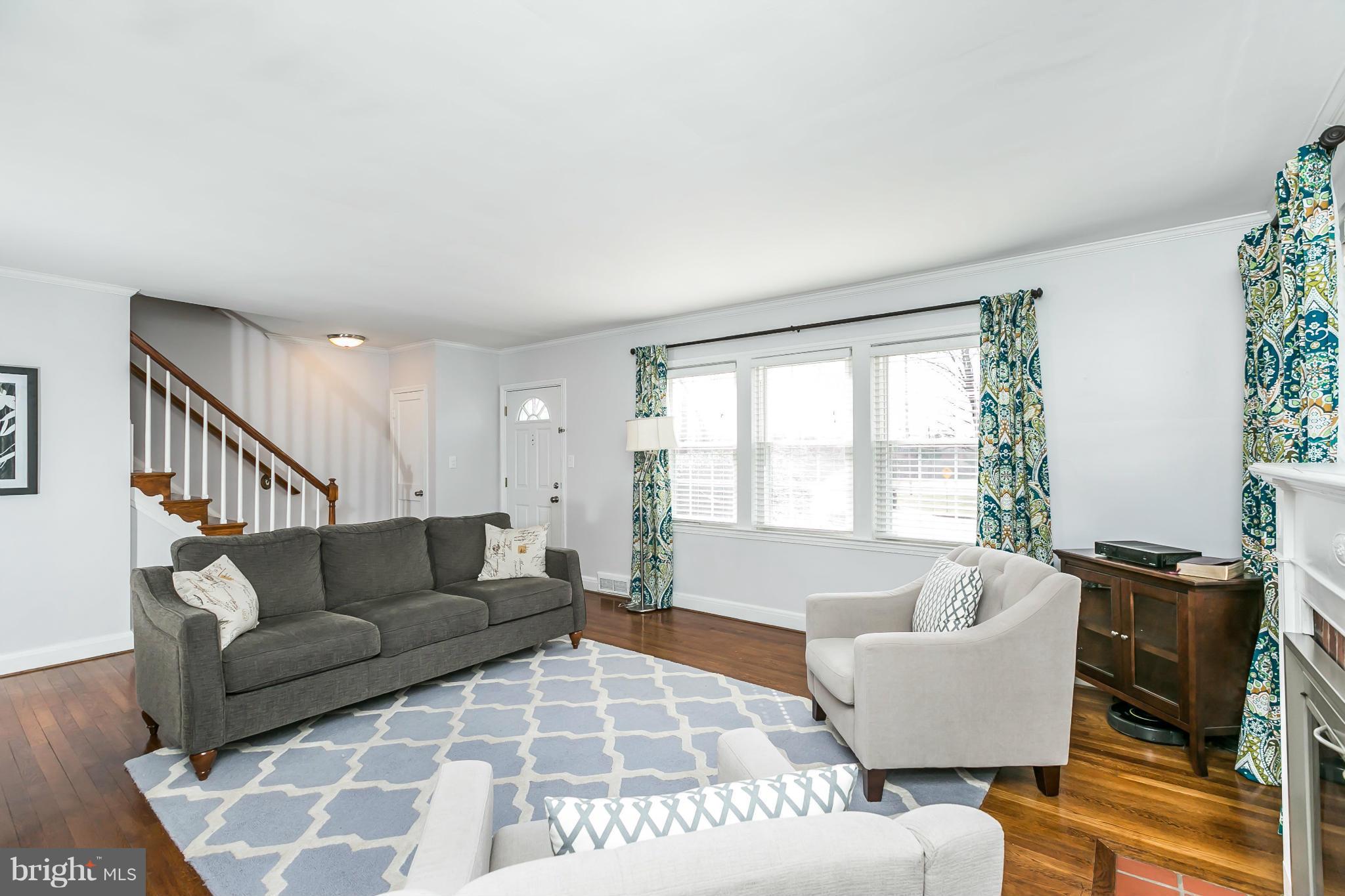 1947 Edgewood Road Baltimore, MD 21286 - Photo 7 of 28 a living room with furniture and a large window
