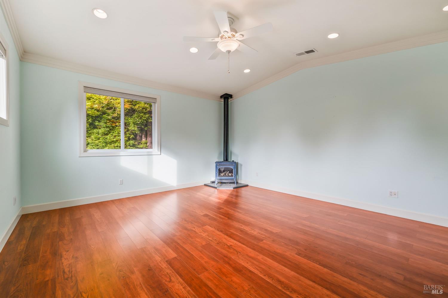 16611 Pearl Ranch Road Fort Bragg, CA 95437 - Photo 41 of 71 a view of empty room with wooden floor and fan