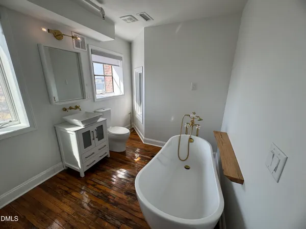 a bathroom with sink and mirror